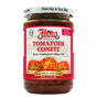 Jar of Flora Foods Tomatoes Confit in 10.2 oz jar showing glossy, caramelized cherry tomatoes in oil with fresh herbs