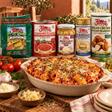 Sunday Rigatoni Family Feast Box with original products and a prepared pasta serving suggestion