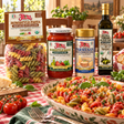 Tomato Basil Fusilloni Family Dinner Pack with original products and a prepared pasta serving suggestion